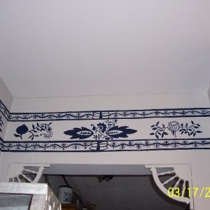 I collect dishes with this pattern. I did a mural of the pattern along the ceiling in my kitchen. It's called "Zwiebelmuster" ("Blue Onion"), and it's