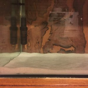 Close up. Custom made veneer river wood background. Exterior.