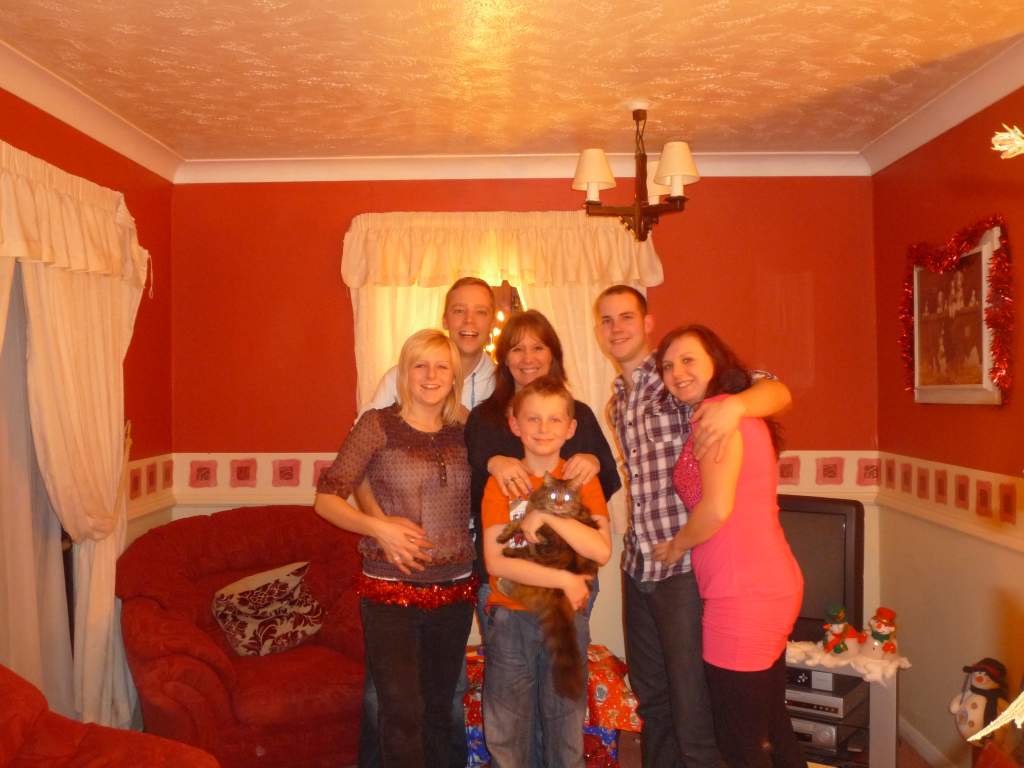 From left to right - Faye (my sister), Oli (her boyfriend), my Mum (Sue), Billy (little brother) holding Macie their cat and then Lee and myself.