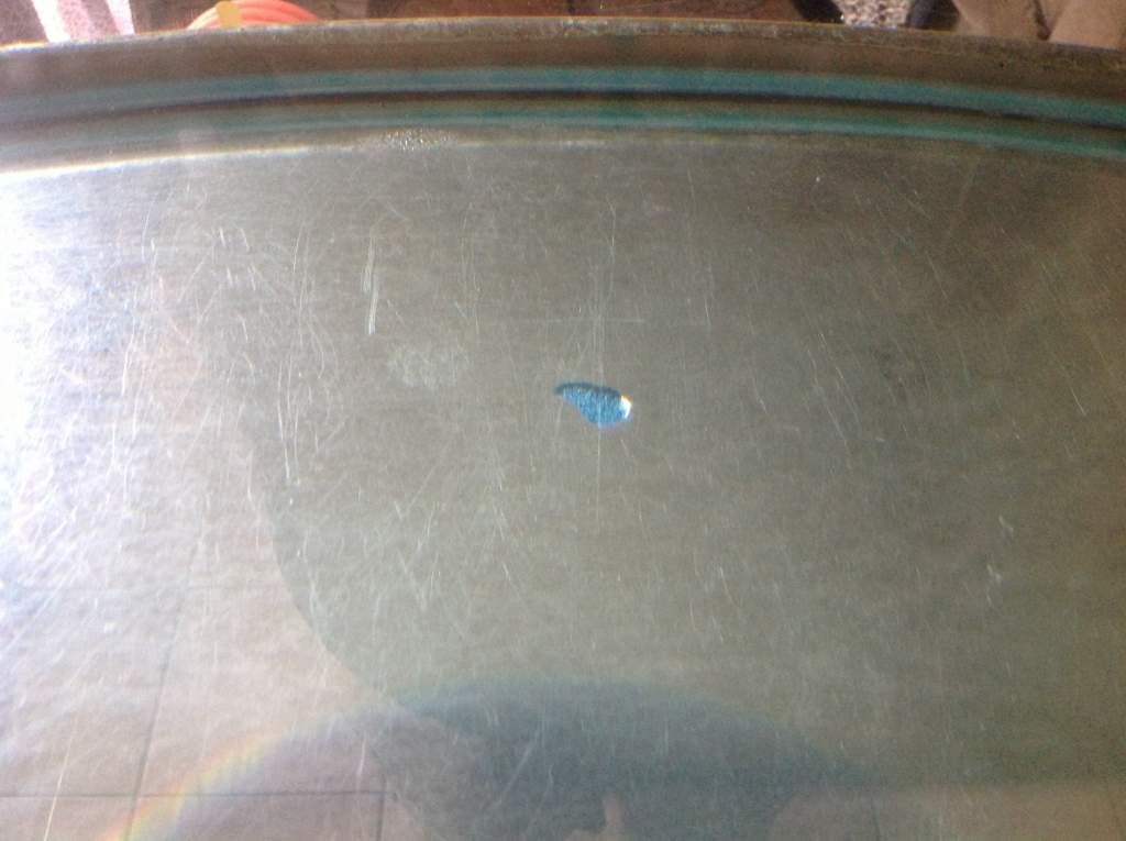 It is either just spreading out (about 20 minutes ater) or getting bigger? No obvious leak atound the edges, it's in the middle of a full sheet of gla