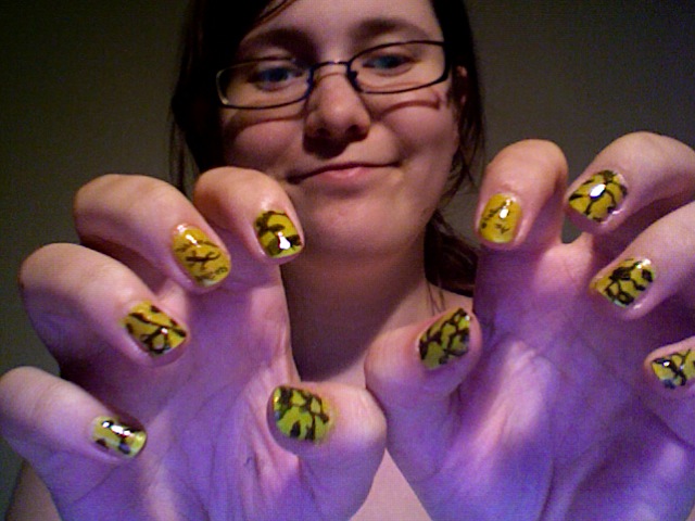 yes, i know, i look ridiculous but cool nails huh! :p